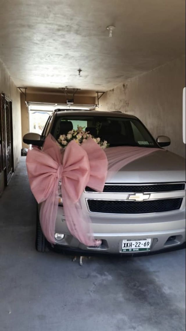 Elegant Silver Car Decoration with Large Pink Tulle Bow and White Flowers
