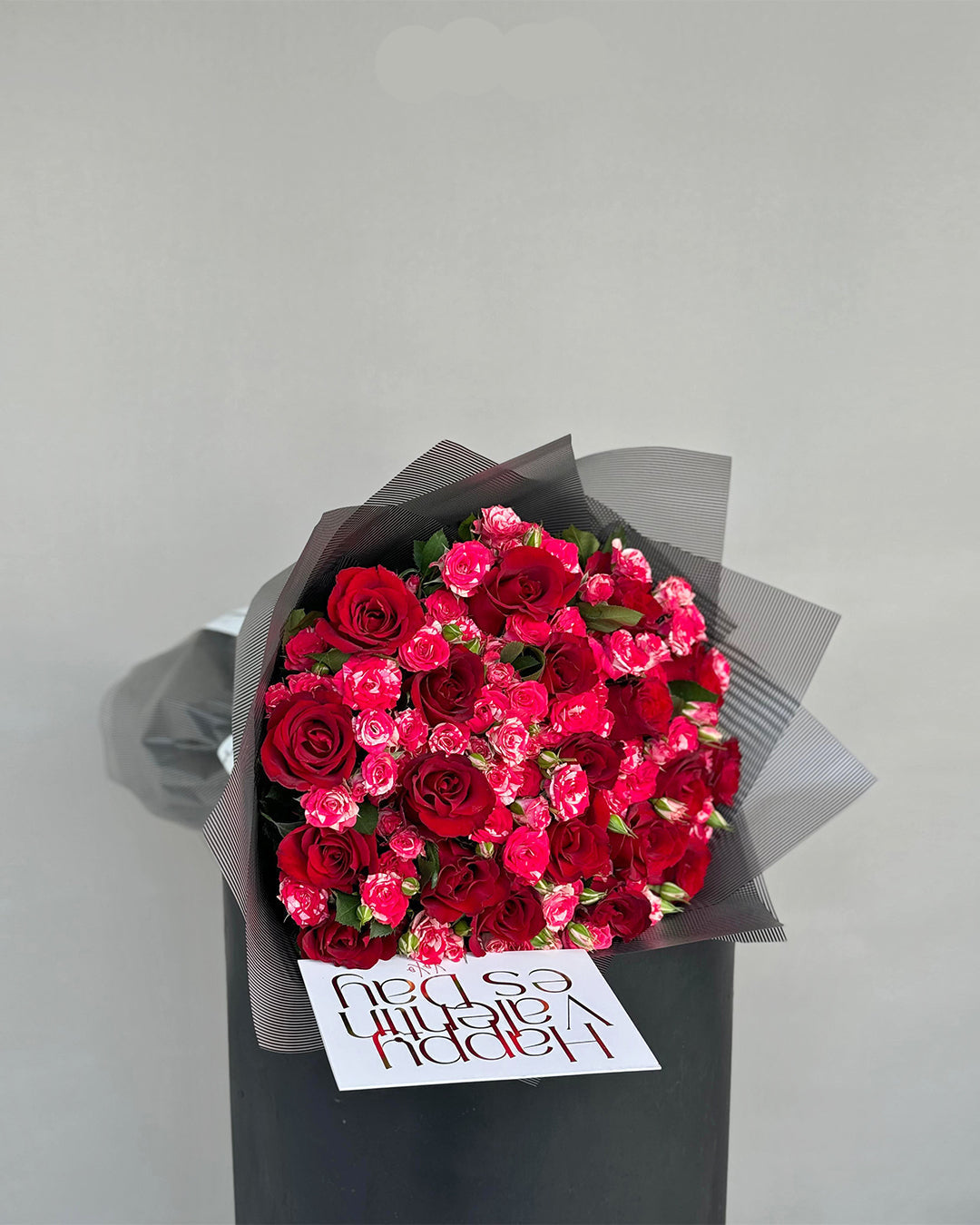 Elegant Red and Pink Spray Rose Bouquet in Grey Wrap