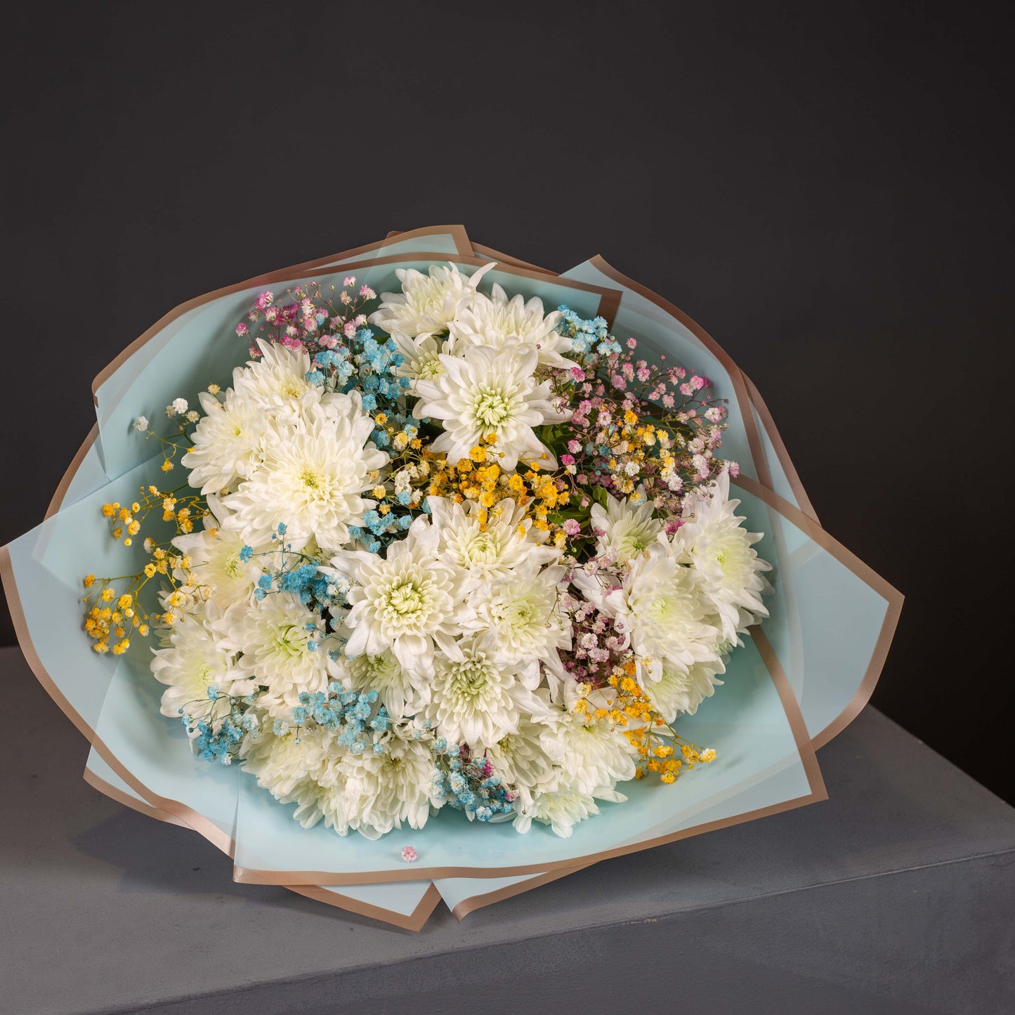 White Chrysanthemum & Vibrant Gypsophila Bouquet in Sky Blue Wrap