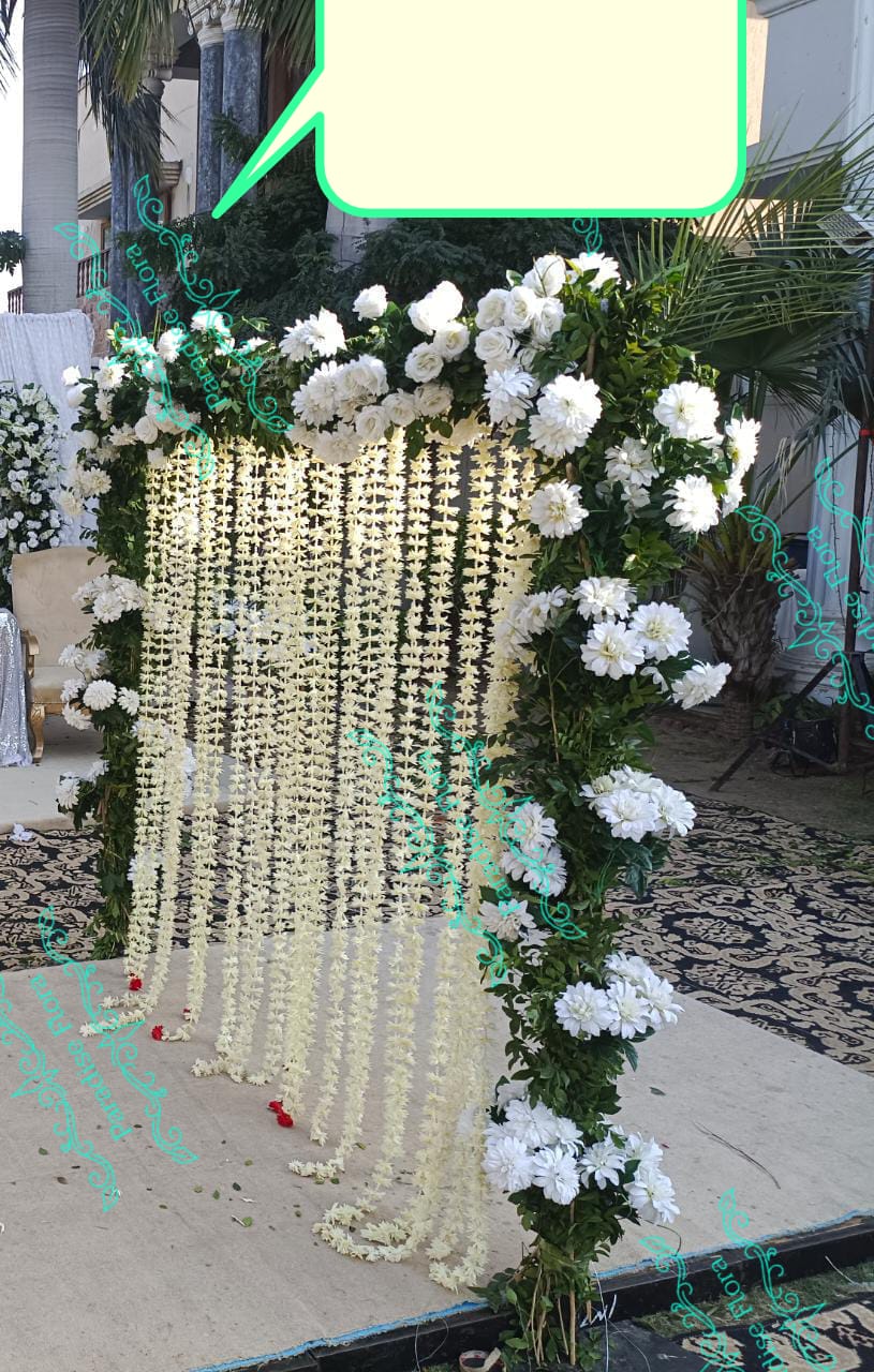 Elegant White Floral Arch with Jasmine String Backdrop