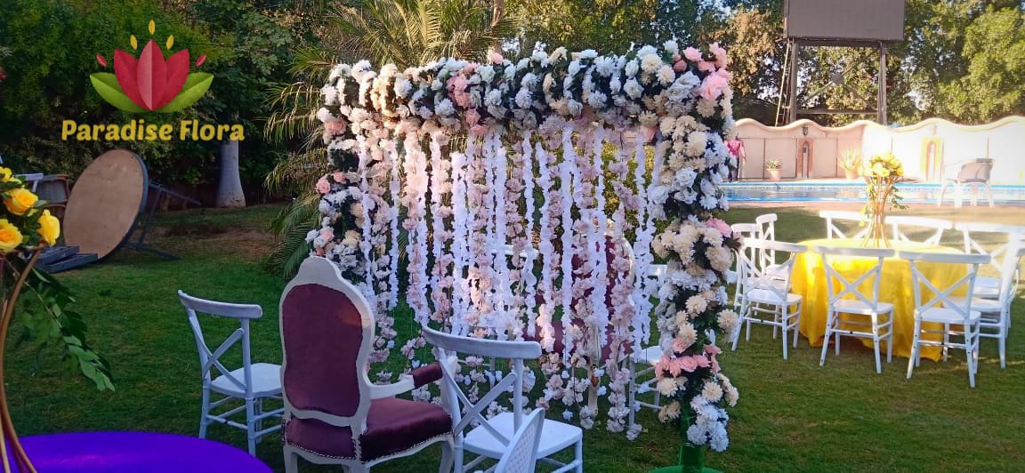 Elegant Floral Arch Backdrop with Hanging Flower Garlands