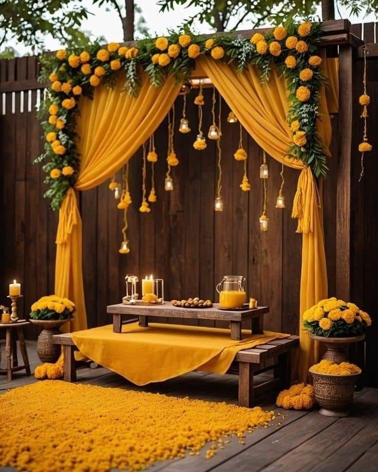 Marigold Mehndi Floral Backdrop with Yellow Drape and Hanging Diya Lights