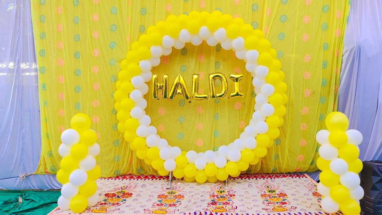 Vibrant Yellow & White Circular Balloon Backdrop for Haldi Ceremony