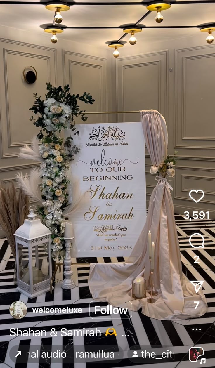 Elegant Wedding Welcome Sign with Floral Garland and Silk Draping