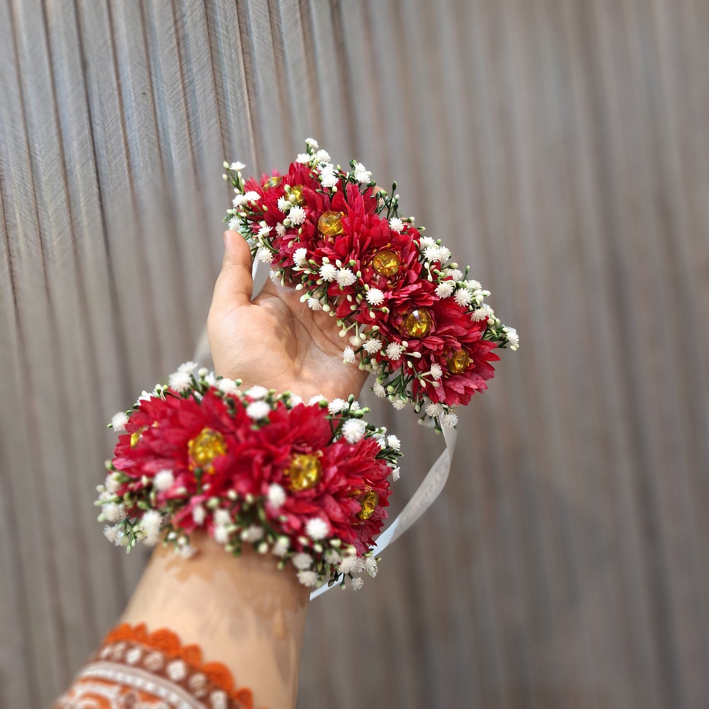 Red Floral Gaira with White Baby’s Breath and Golden Accents