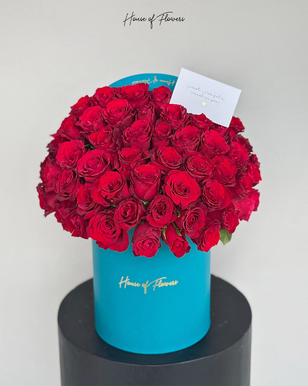 Premium Red Rose Box Arrangement in Turquoise Cylinder