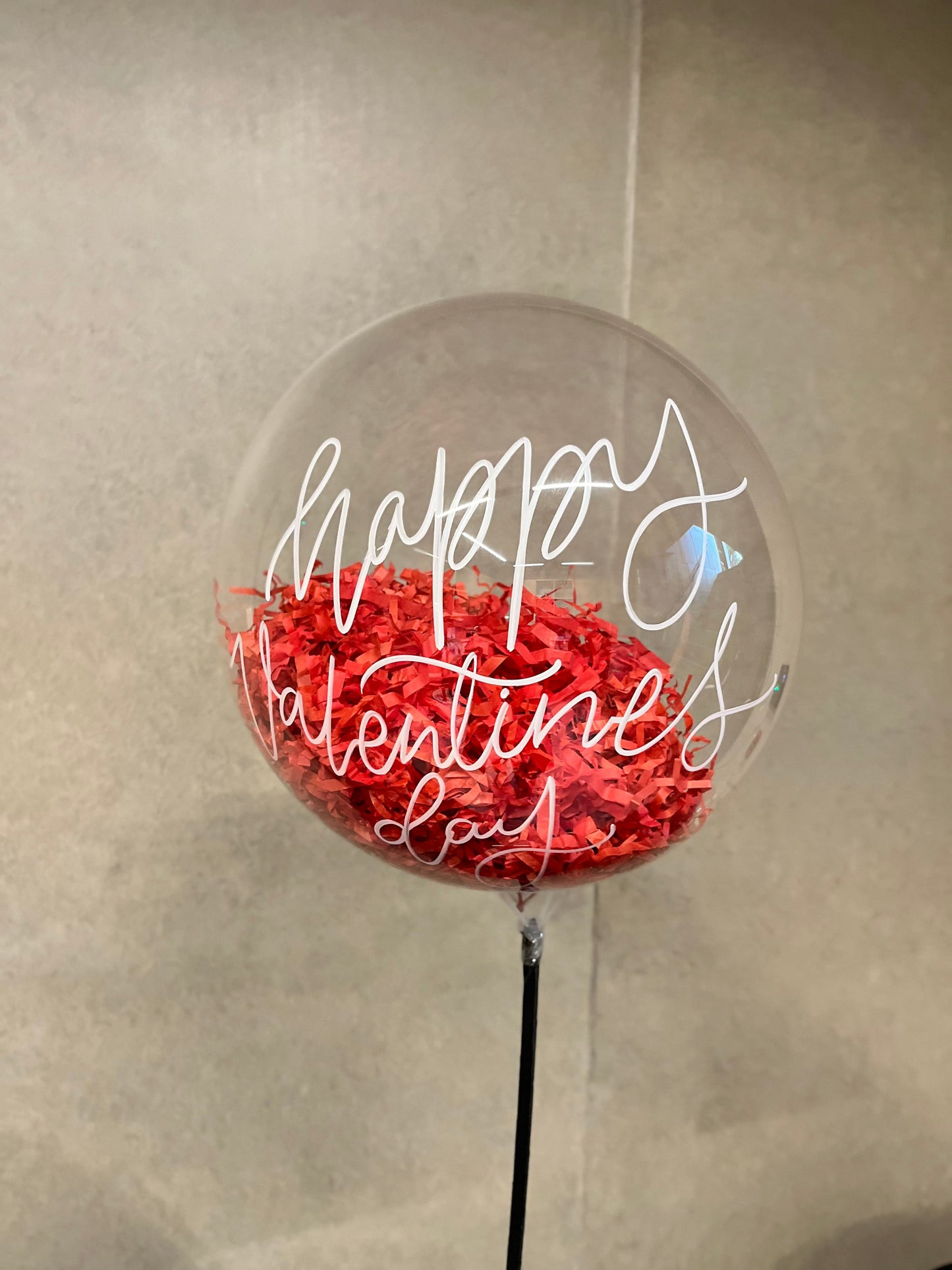 Clear Bubble Balloon with Red Paper Shreds & Valentine’s Script