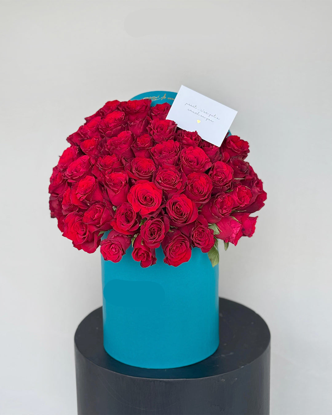 Premium Red Rose Box Arrangement in Turquoise Cylinder
