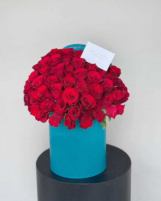 Premium Red Rose Box Arrangement in Turquoise Cylinder