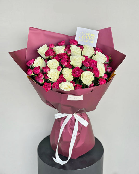 Elegant White Roses & Magenta Spray Rose Bouquet in Burgundy Wrap