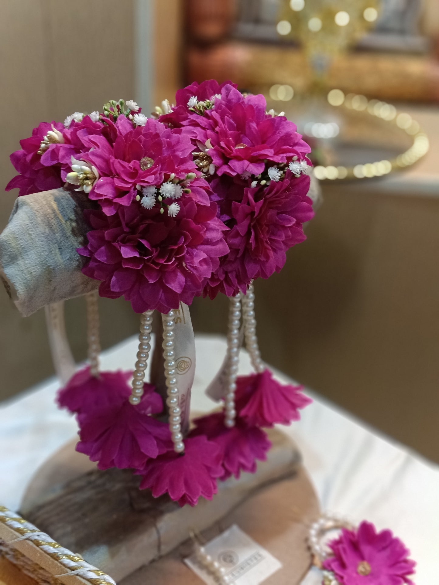 Elegant Magenta Floral Gajray with Pearl Tassels
